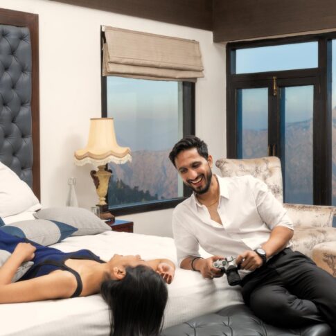 Couple enjoying in the room at Koti Resort, Mashobra